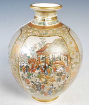 A Japanese Satsuma pottery vase, Meiji Period, decorated with four rectangular-shaped panels