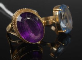 Two 9ct gold gem set dress rings, one blue synthetic spinel, the oval facet cut stone estimated to