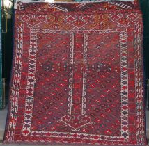 A Kazak type rug, early 20th century, the rectangular field centred with an arrow shaped motif and