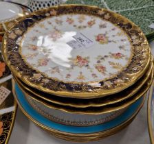 A group of four antique hand-painted floral decorated dessert plates, together with a part fruit set