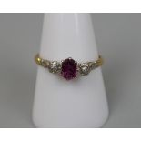 18ct gold ruby & diamond 3 stone ring - Size: R