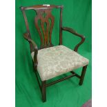 Antique upholstered armchair
