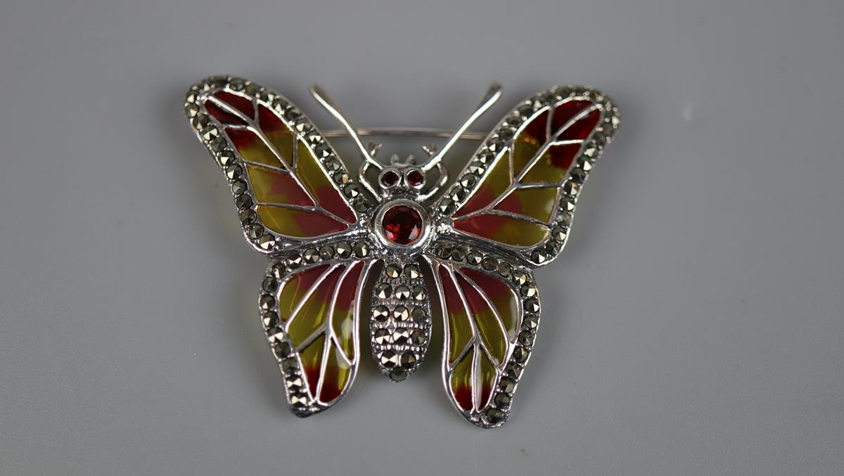 Silver & enamel butterfly brooch set with garnet