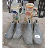 2 pairs of cast iron shoe lasts together with 2 steins