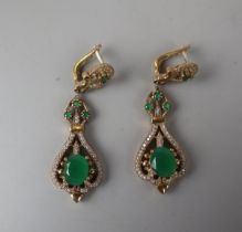Pair of silver & emerald drop earrings