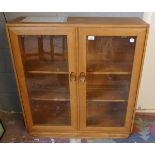 Blonde elm Ercol glazed bookcase - Approx size: W: 92cm D: 29cm H: 98cm