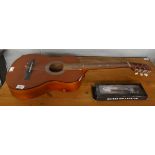 JHS Encore classical acoustic guitar together with a novelty miniature guitar