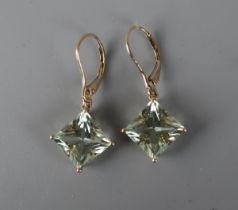 Pair of 9ct gold blue topaz set drop earrings