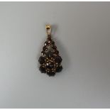 8ct gold garnet set pendant