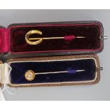 Gold diamond set stick pin together with equestrian themed gold stick pinÿ