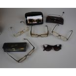 Collection of glasses and sunglasses etc