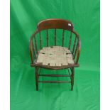 Oak spindle back elbow chair