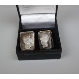 Pair of silver & carved mother-of pearl-cufflinks