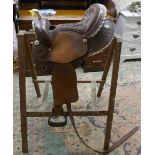 Good quality leather saddle with stitch suede seat and stand