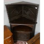 Antique oak carved corner cupboard