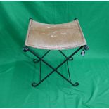 Cow hide folding cast iron stool
