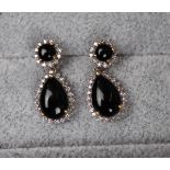 Pair of 9ct gold garnet and diamond rock earringsÿ