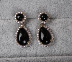 Pair of 9ct gold garnet and diamond rock earringsÿ