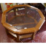 Octagonal glass and bergere coffee table