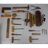 Collection of antique tools to include brass levels