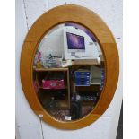Oak oval mirror with bevelled glass