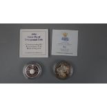 Fiji 1947-1997 Silver Proof $10 Dollars Coin together with 1994 United Kingdom Silver Proof œ2