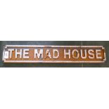 The Mad House wooden sign