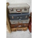 5 vintage suitcases