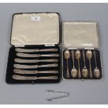 Hallmarked silver teaspoons, sugar tongs and silver handled butter knives