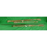 3 vintage fishing rods to include Army & Navy together with a wooden bow A/F