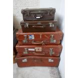 5 vintage suitcases