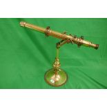 Brass table top telescope on stand