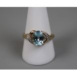 9ct gold blue topaz and diamond set ring - Size: T