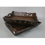 Pair of carved wooden trays