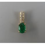 9ct gold emerald and diamond set pendant