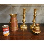 Collection of brass to include elephant claw bell, candlesticks and churn