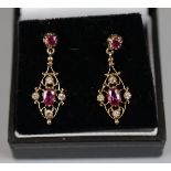Pair of ruby and diamond gold set earrings