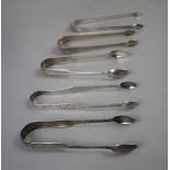 5 pairs of hallmarked silver tongs to include Georgian examples. George III Dublin by Richard