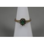 9ct gold emerald and diamond cluster ring - Size K