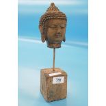 Stone Buddha on plinth - Approx height: 30cm