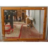 Pine framed bevelled glass mirror