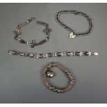 4 silver bracelets