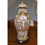 Oriental Famille Rose lidded vase on wooden stand with some restoration - Approx height: 67cm