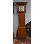 Antique oak grandfather clock with brass face and 30 hour movement