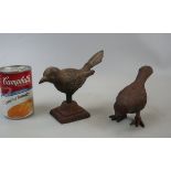 2 cast iron bird figurines