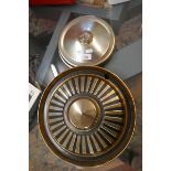 Set of 4 Triumph hubcaps together with 2 others