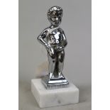 Car mascot Manneken Pis on marble base