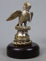 Swan car mascot on pedestal