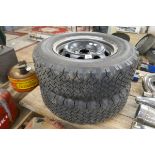 Pair of unused 15 inch steel rims with 2 winter tyres