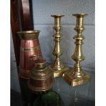 Collection of brass to include elephant claw bell, candlesticks and churn